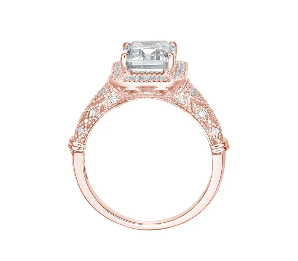 Emerald Cut and Round Brilliant halo engagement ring with 2.9 carats* of diamond simulants in 10 carat rose gold